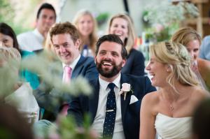 guests enjoying the speeches at this marquee wedding in reigate