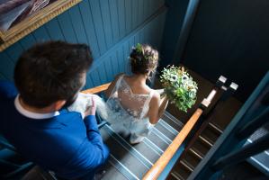 bride walking down the stairs at rosendale pub wedding ceremony in west dulwich london